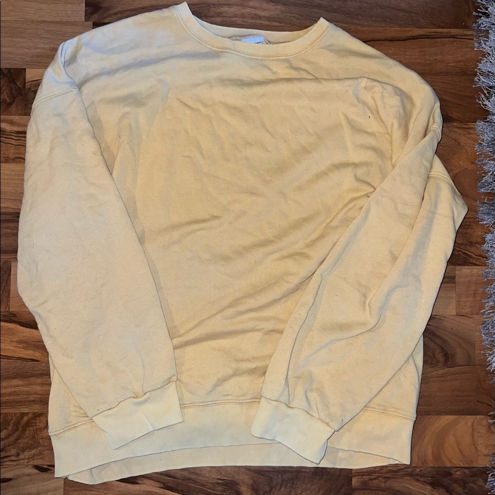 Distressed yellow crew neck